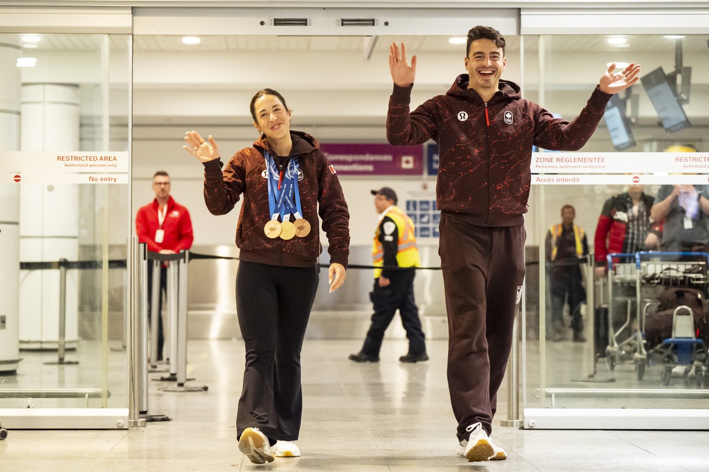 Photo Gallery: Canada's Olympians arrive home | iNFOnews.ca