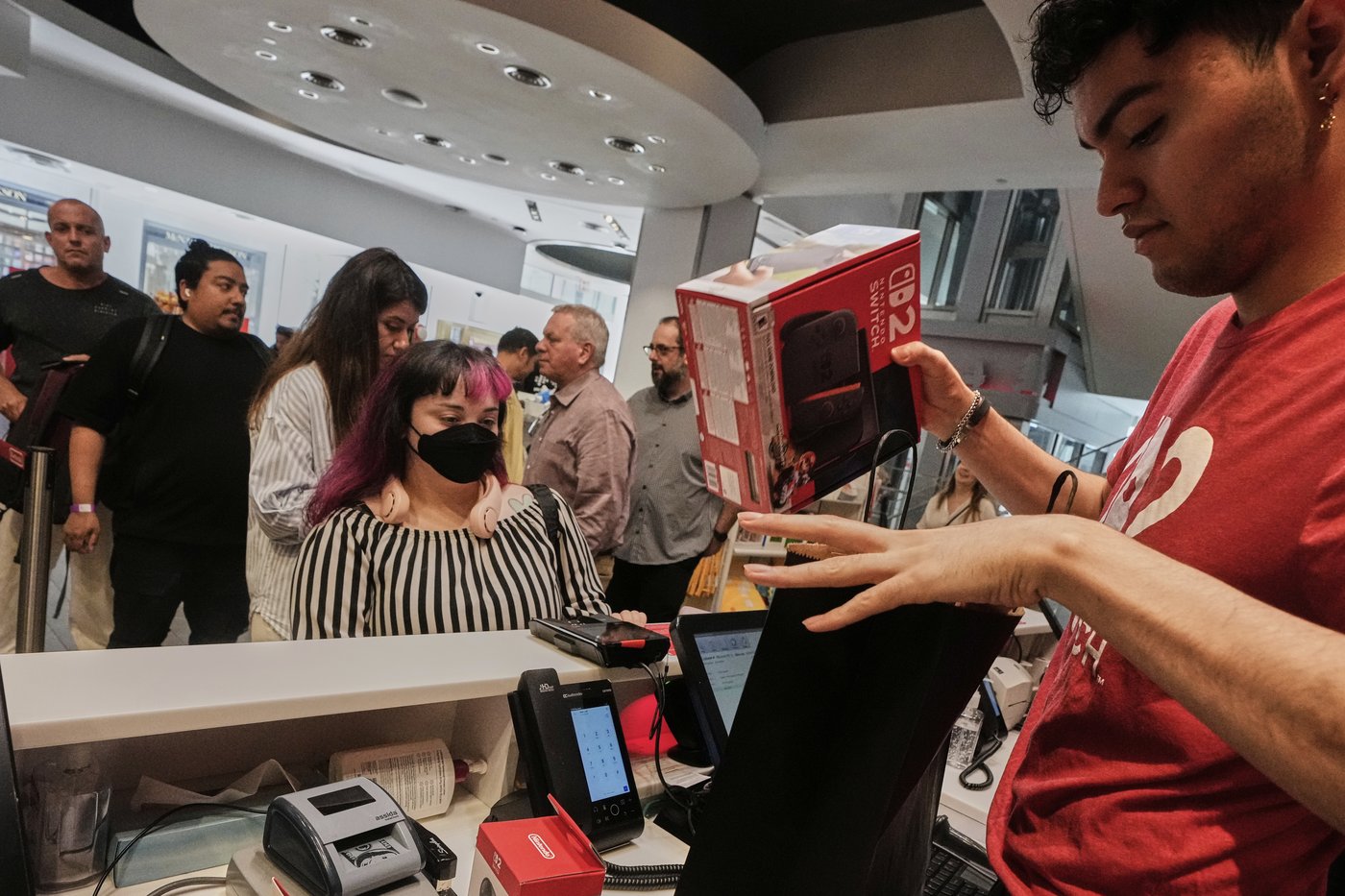 Fans around the world queue up in long lines for the highly anticipated Nintendo Switch 2 launch | iNFOnews.ca
