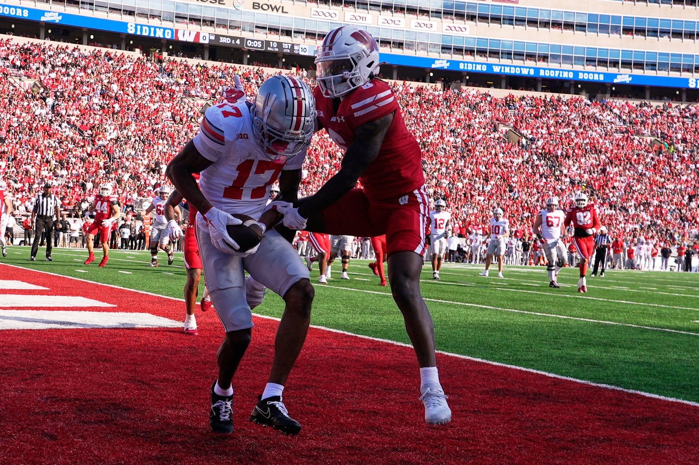 Sayin throws 4 TD passes as No. 1 Ohio State throttles Wisconsin 34-0 | iNFOnews.ca