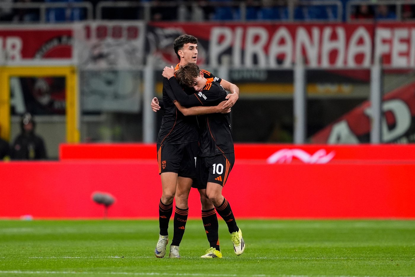 AC Milan falls seven points behind leader Inter in title race after 1-1 home draw with Como | iNFOnews.ca