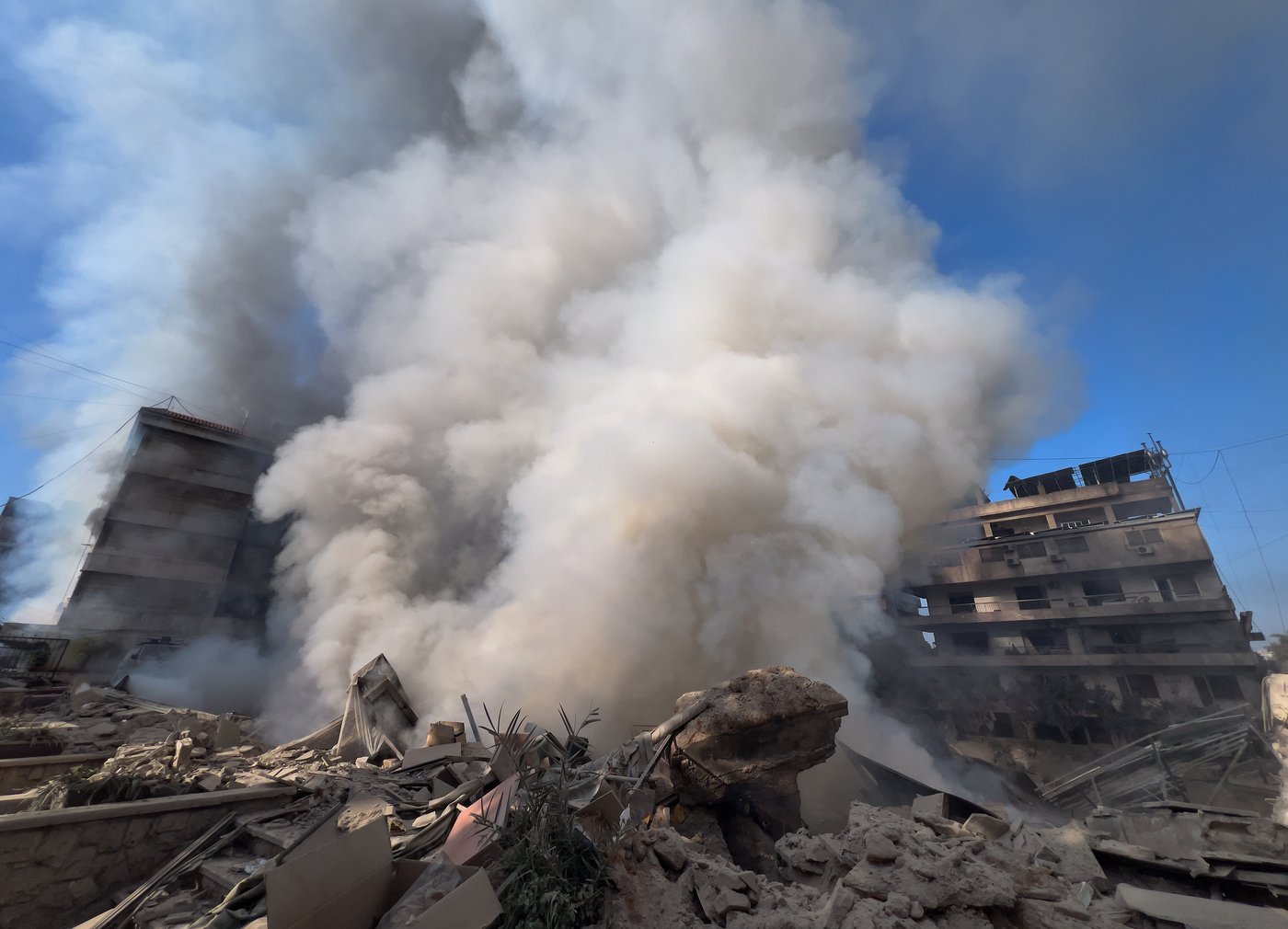 Photos show Lebanese people fleeing and buildings wrecked after Israeli strikes | iNFOnews.ca