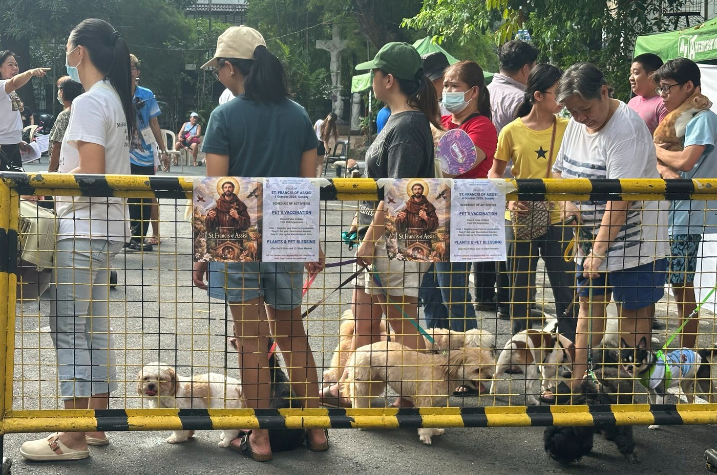Wagging tails fill a Philippine church where priests bless pets for St. Francis feast | iNFOnews.ca Wagging tails fill a Philippine church where priests bless pets for St. Francis feast | iNFOnews.ca