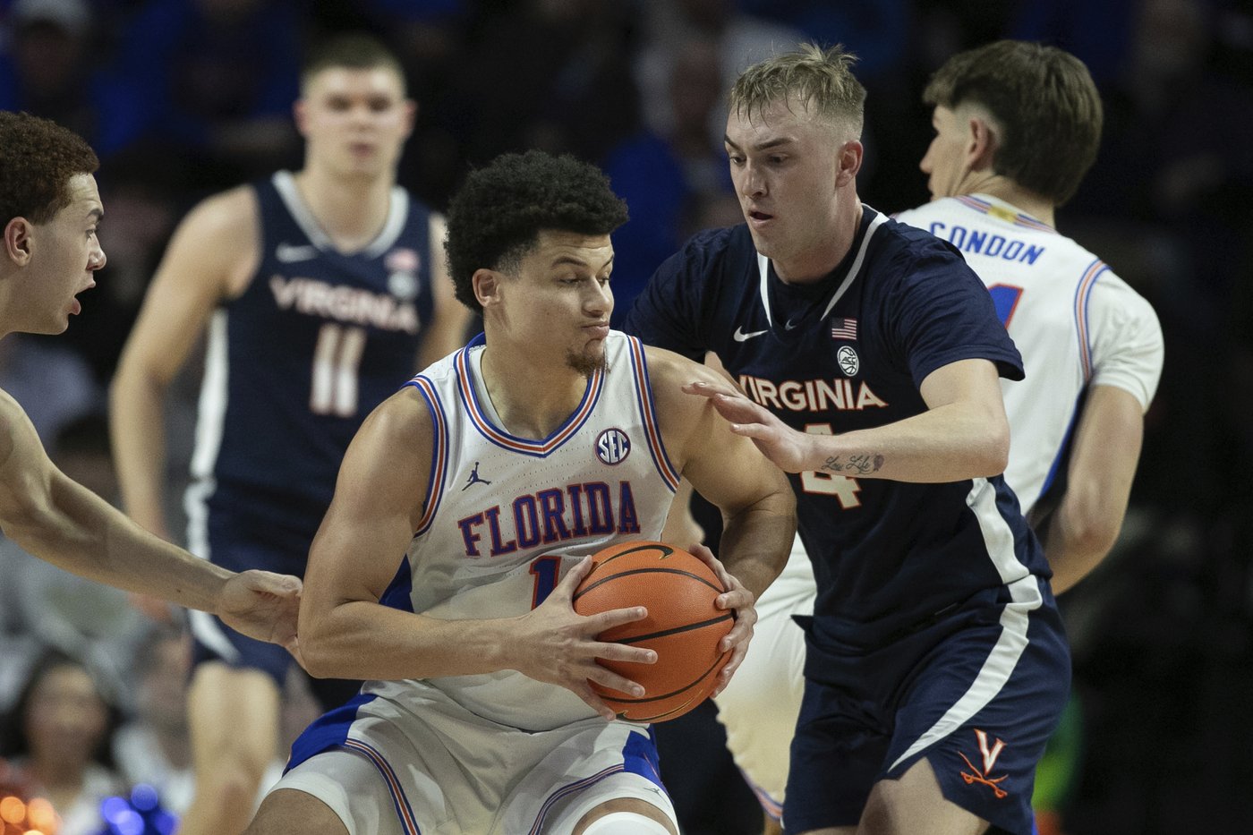 Walter Clayton scores 27 points, No. 13 Florida beats Virginia 87-69 in SEC/ACC Challenge | iNFOnews.ca