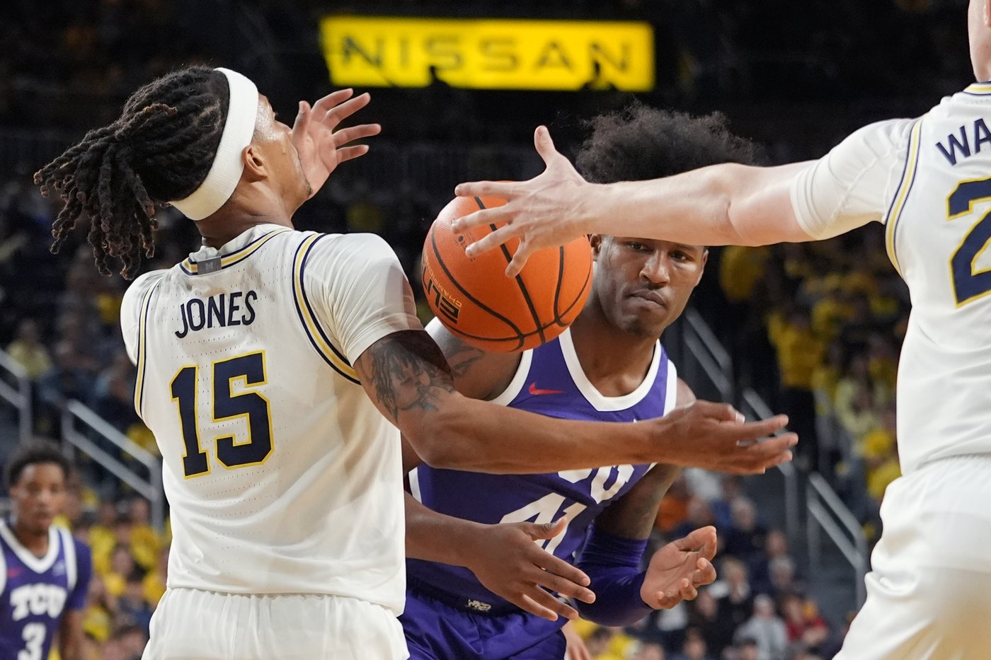 Nimari Burnett scores 16 and Danny Wolf secures a double-double to lead Michigan past TCU 76-64 | iNFOnews.ca