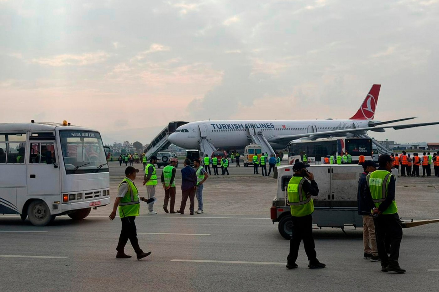 Turkish Airlines jet safely evacuated after landing gear smoke at Nepal airport | iNFOnews.ca