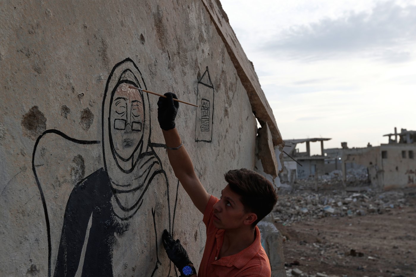 Syrian artists transform bombed-out house into a mural of remembrance, in photos | iNFOnews.ca Syrian artists transform bombed-out house into a mural of remembrance, in photos | iNFOnews.ca