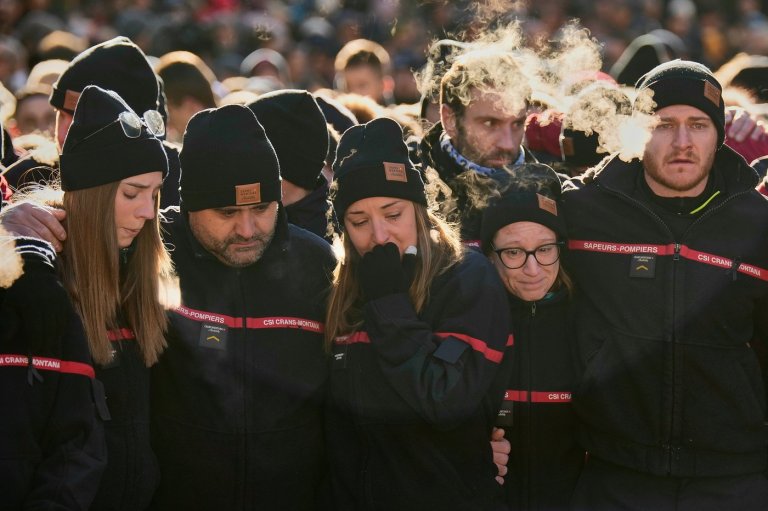 Hundreds march in silence to honor victims of Swiss bar fire that left 40 dead | iNFOnews.ca