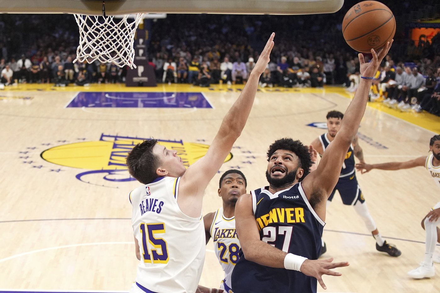 Jokic score 34, Porter adds 24 as Nuggets use strong second half to beat Lakers 127-102 | iNFOnews.ca