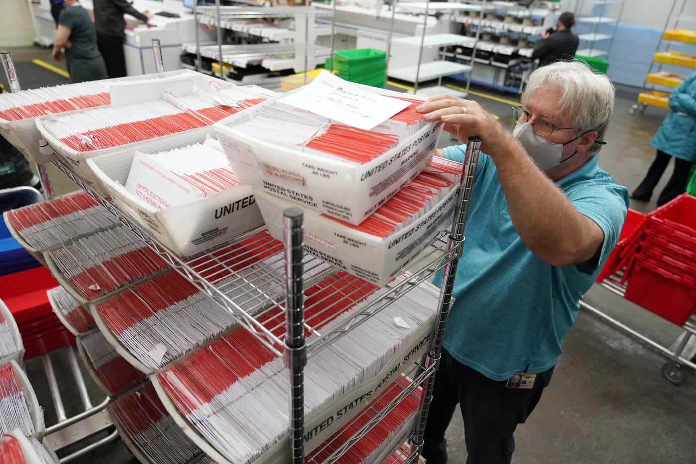 Rain, humidity have sealed some mail-in ballot return envelopes shut, elections officials say | iNFOnews.ca