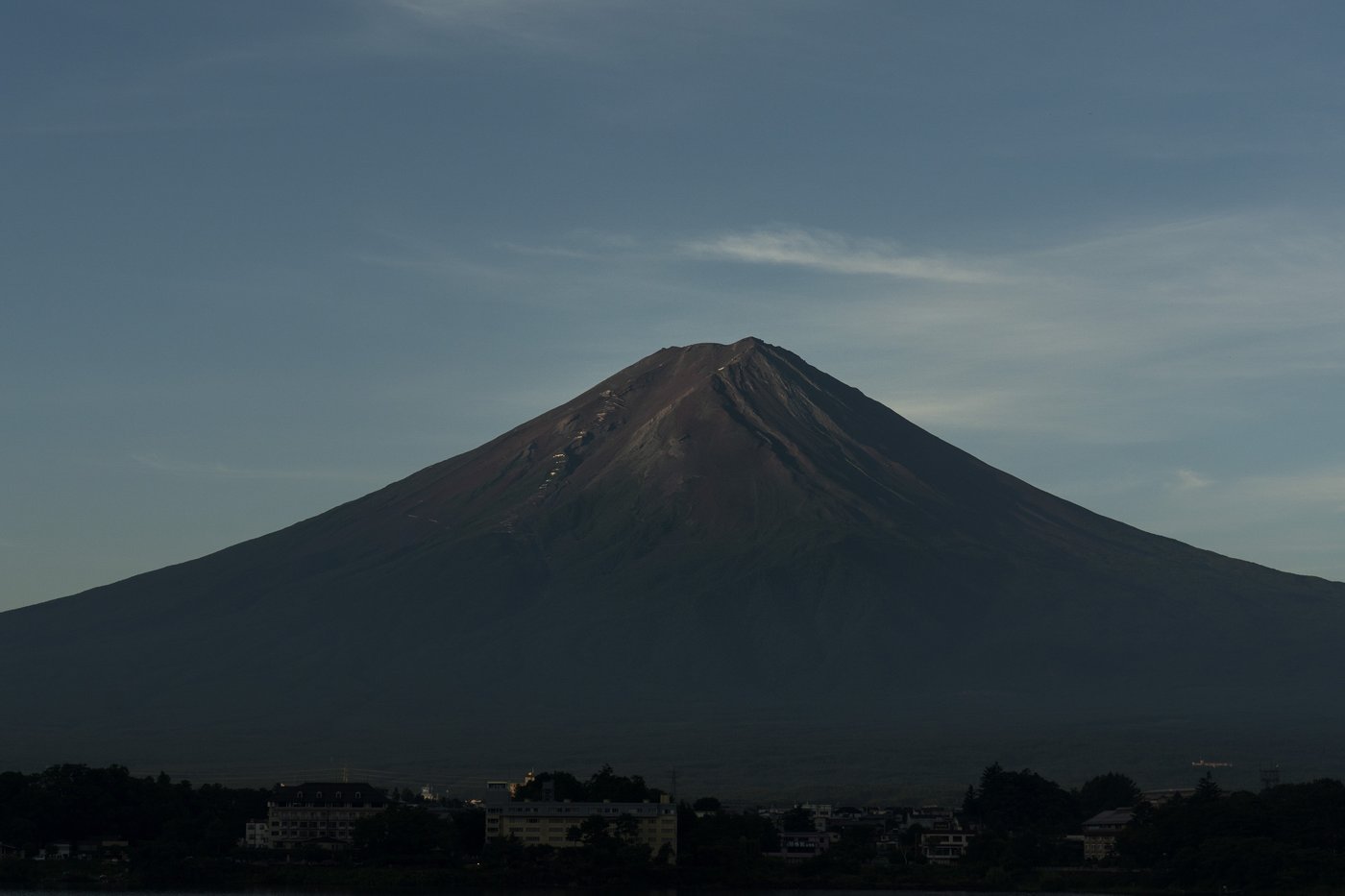 It's not official yet but Mount Fuji gets its trademark snowcap after the longest delay in 130 years | iNFOnews.ca