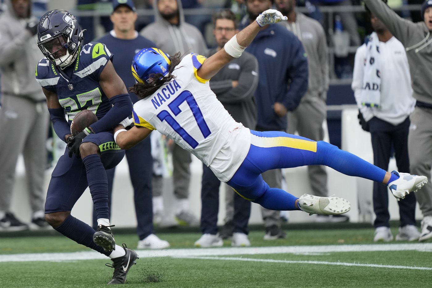 Rams wide receiver Puka Nacua ejected after throwing punch at Seahawks linebacker Tyrel Dodson | iNFOnews.ca