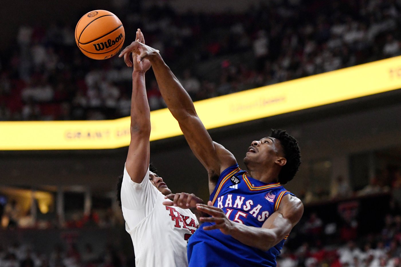 Darryn Peterson hits two late 3s as No. 11 Kansas wins 64-61 at No. 13 Texas Tech | iNFOnews.ca