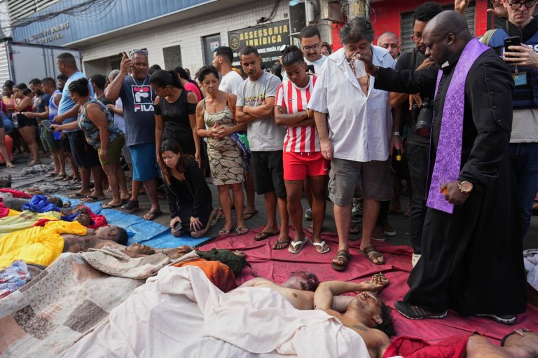 Brazilians in a Rio favela line up bodies after the city's deadliest police raid | iNFOnews.ca Brazilians in a Rio favela line up bodies after the city's deadliest police raid | iNFOnews.ca