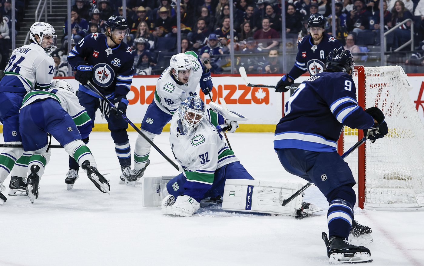 Morrissey scores in OT as Jets slip past Canucks 3-2 | iNFOnews.ca Morrissey scores in OT as Jets slip past Canucks 3-2 | iNFOnews.ca