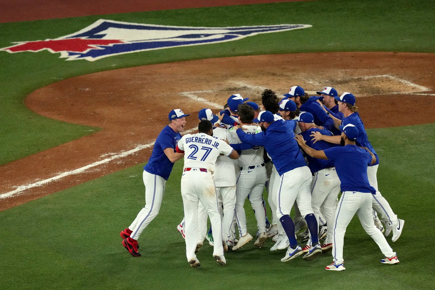 Photo Gallery: Blue Jays advance to World Series with 4-3 win over the Mariners | iNFOnews.ca