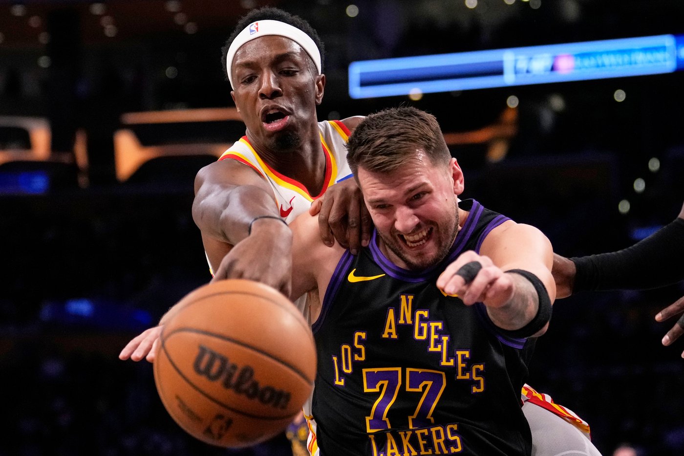 LeBron barely misses triple-double, Luka adds 27 in Lakers' skid-snapping 141-116 win over Hawks | iNFOnews.ca