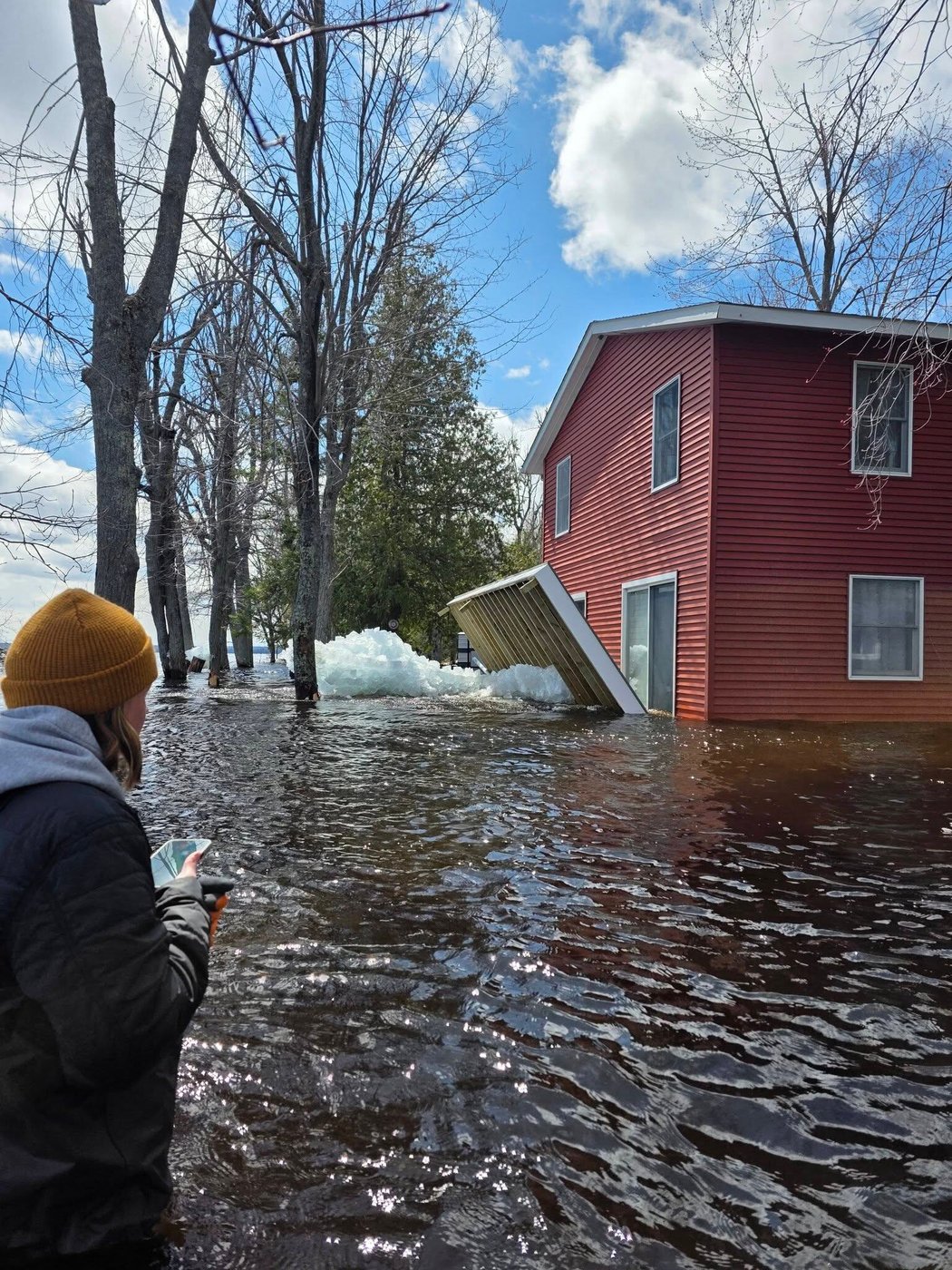 Heavy rain and snowmelt are hurtling large chunks of ice into northeastern Michigan homes | iNhome