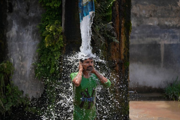 Photos show India sweltering under a severe heat wave | iNFOnews.ca