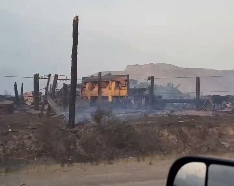 Video shows smouldering aftermath of wildfire outside Clinton, B.C. | iNFOnews.ca