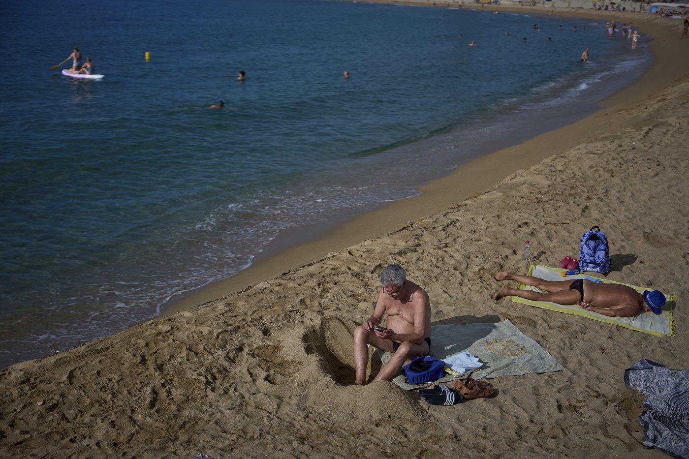 As Spaniards summer at Barcelona's beaches, some worry about the erosion of coastline | iNFOnews.ca As Spaniards summer at Barcelona's beaches, some worry about the erosion of coastline | iNFOnews.ca