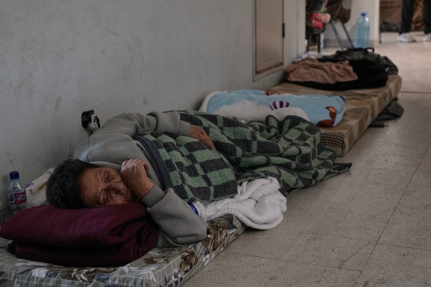 Photos of displaced civilians in Lebanon, where schools and stadiums turn into shelters during war | iNFOnews.ca