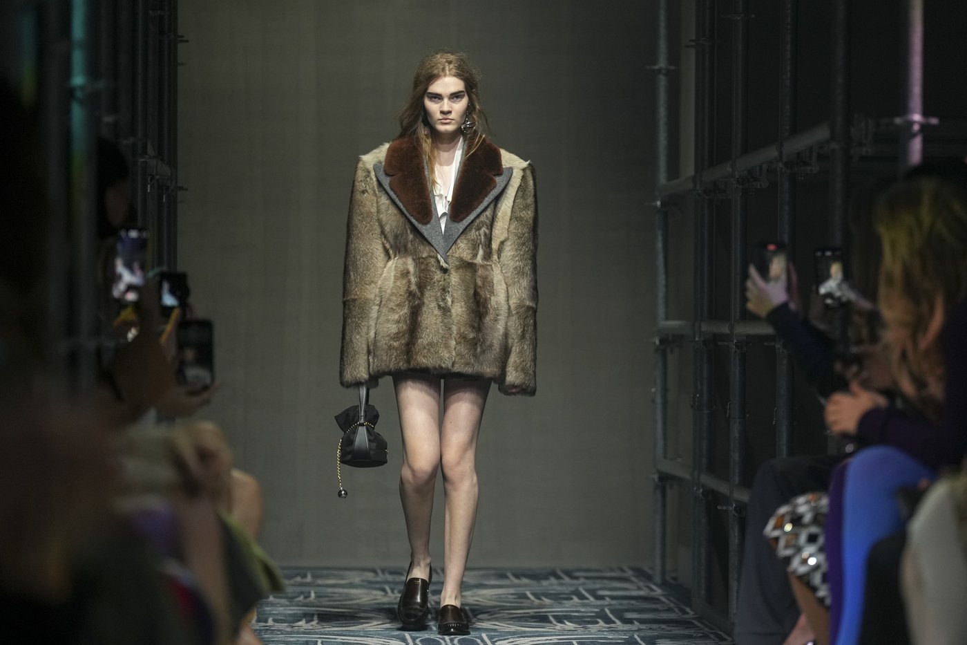 Prada reconstructs femininity starting with the little black dress fit to dark times | iNFOnews.ca