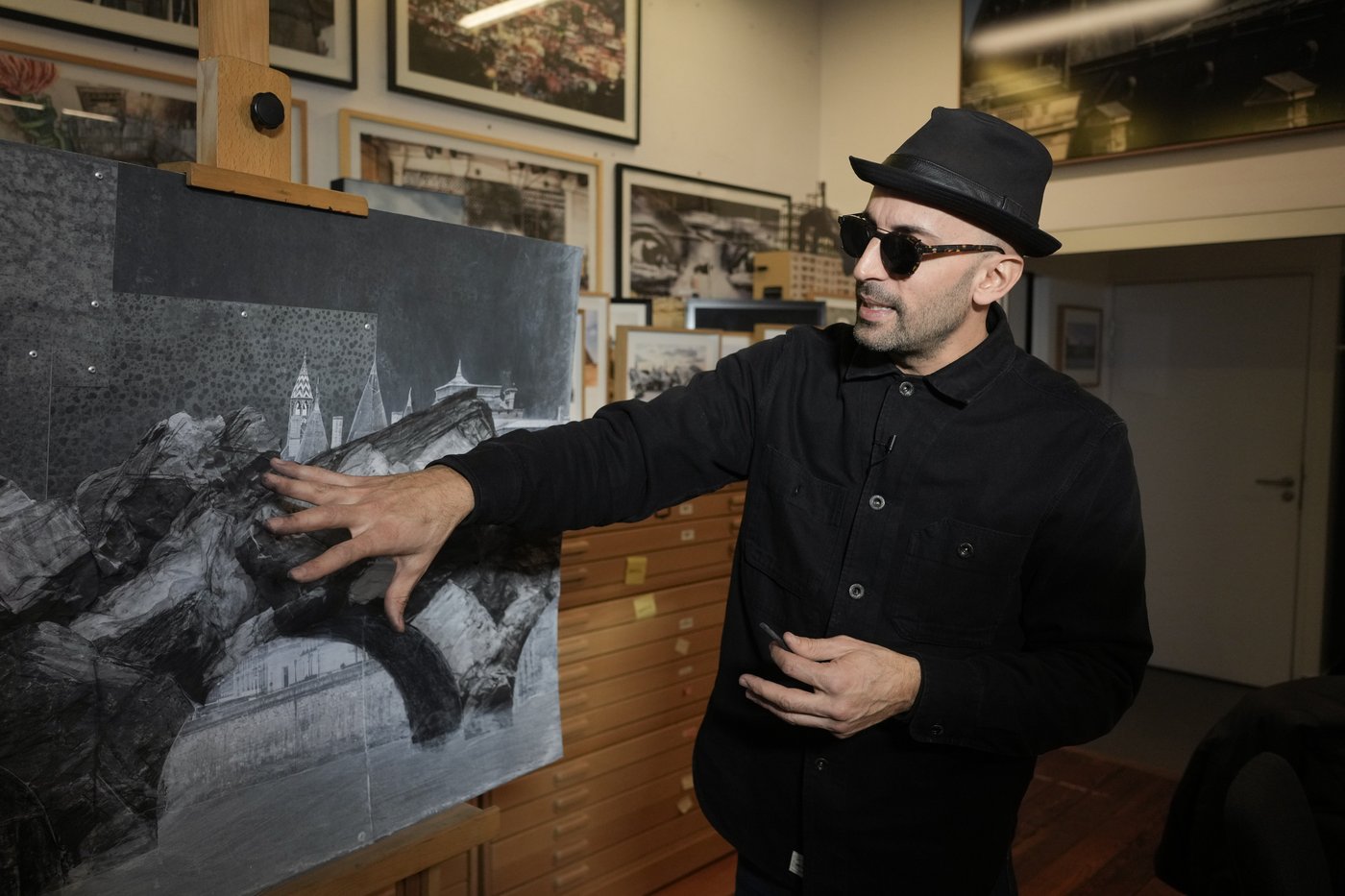 He is known as the French Banksy. Now artist JR plans to turn a Paris bridge into a massive cave | iNFOnews.ca