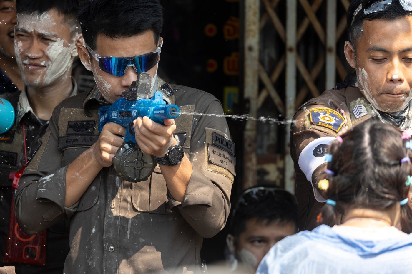 People spray water to celebrate the Thai New Year during the Songkran festival, in photos | iNFOnews.ca