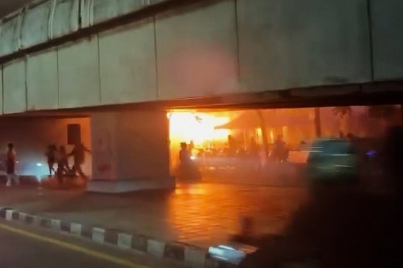 People killed in Bangkok music bar fire were found trapped in windowless bathrooms | iNFOnews.ca