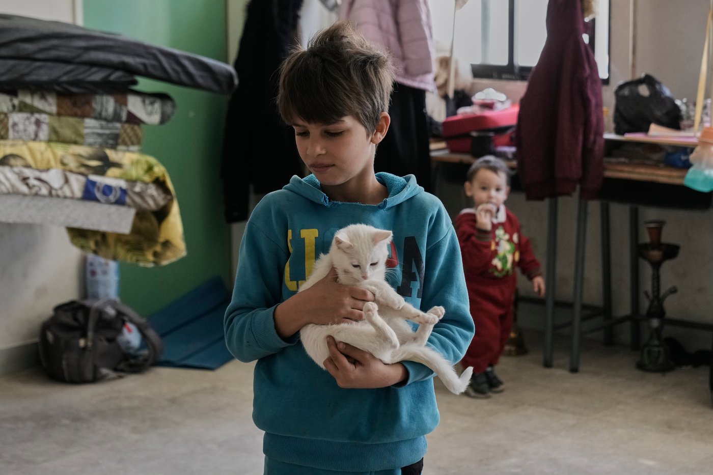 Photos of displaced civilians in Lebanon, where schools and stadiums turn into shelters during war | iNFOnews.ca