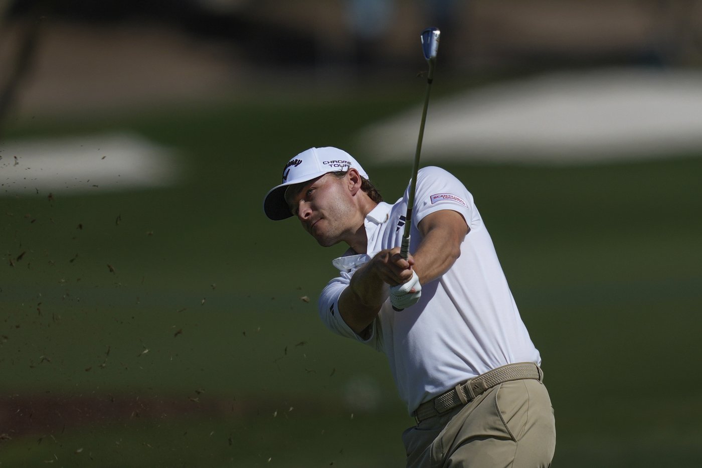Rory McIlroy tied for lead in Dubai, hot-headed Tyrell Hatton fades | iNFOnews.ca