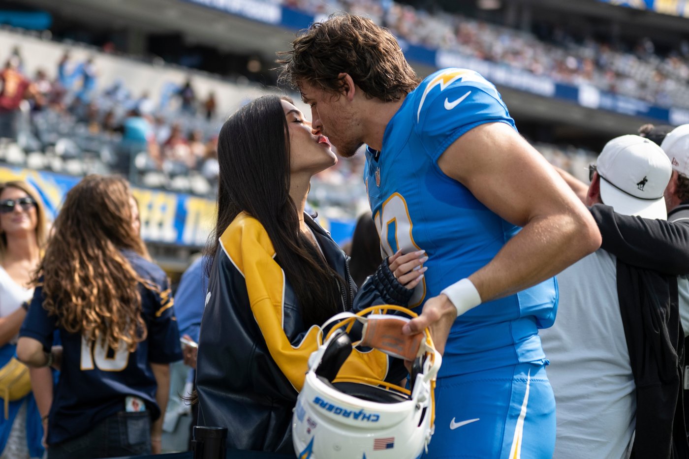 A ring before a playoff win for Justin Herbert, who gets engaged to singer Madison Beer | iNFOnews.ca