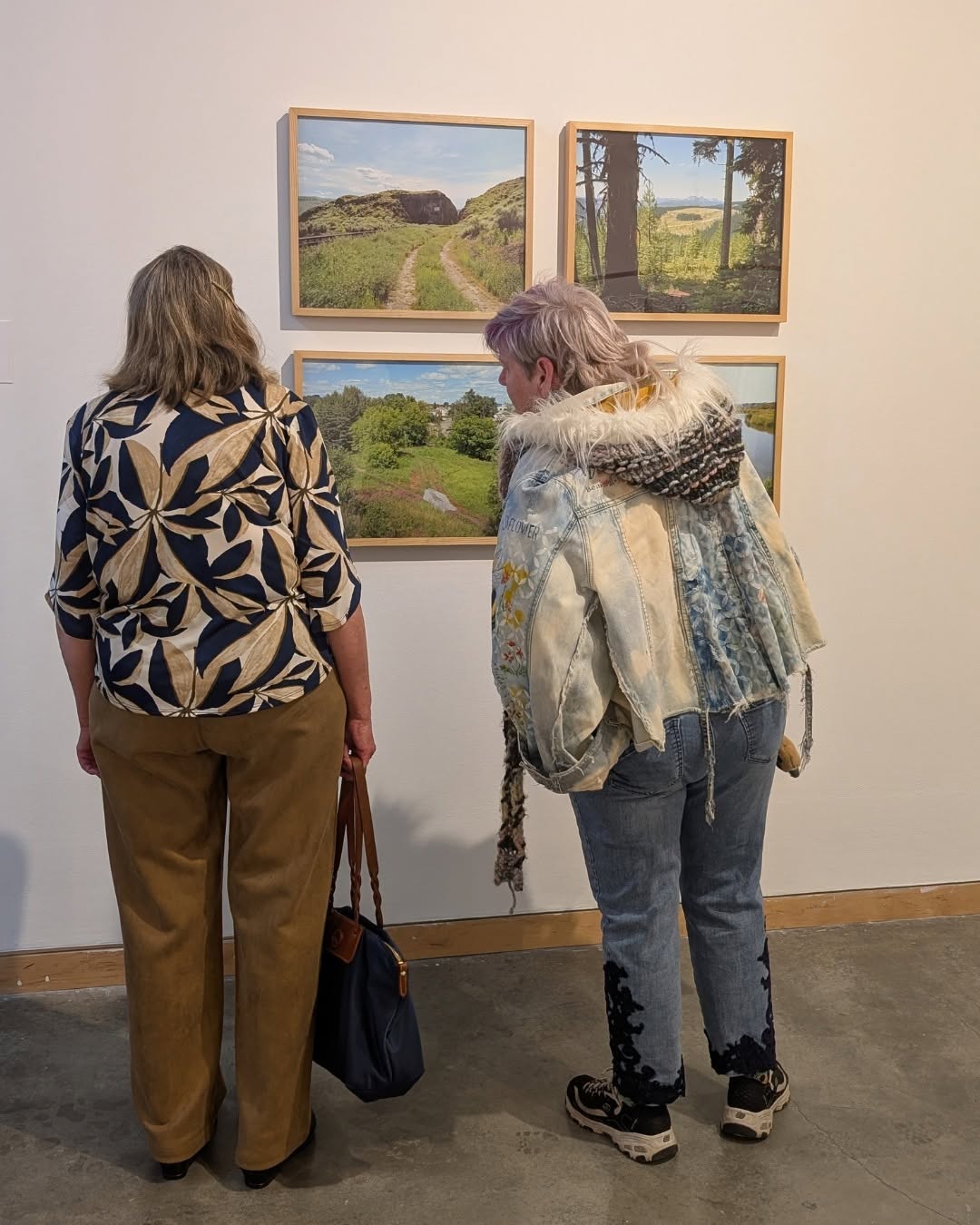 Some attendees looking at some painting at the gallery- photo credits by kamloops art gallery
