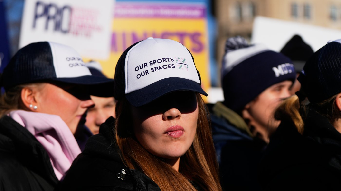 Photos of demonstrators outside the Supreme Court as it considers upholding transgender sports bans | iNFOnews.ca