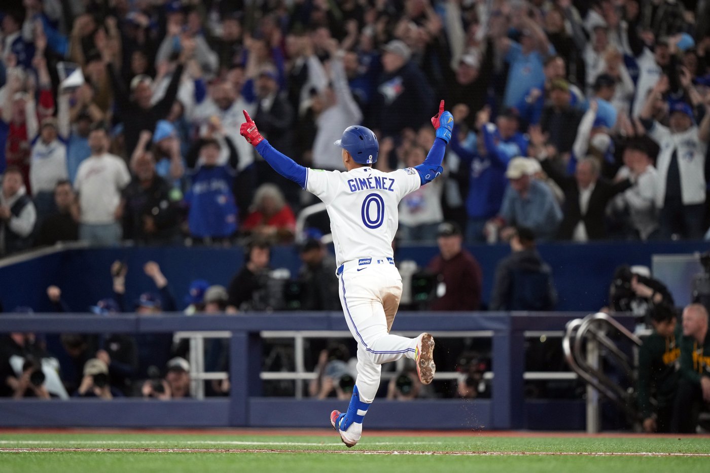 Photo Gallery: Jays open the season with walkoff win over A's | iNFOnews.ca