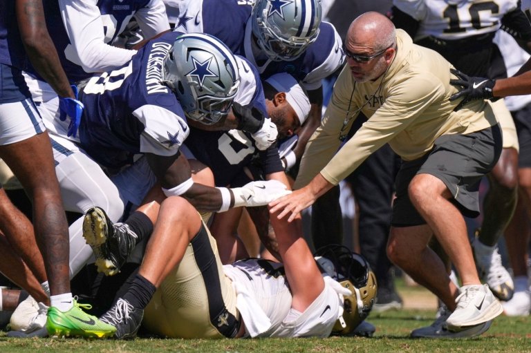 Ronnie Bell carted off because of heat as fights break out during Saints-Cowboys joint practice | iNFOnews.ca