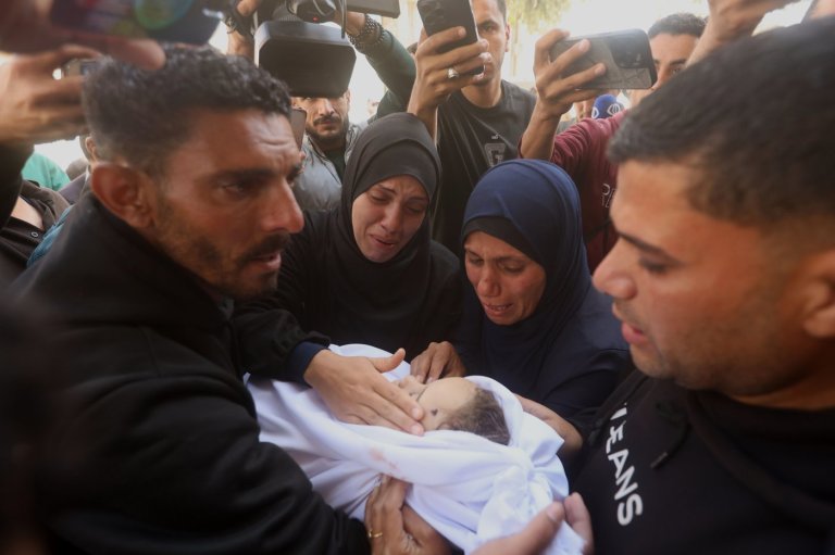 Palestinians hold funerals for pregnant woman and her children killed in Israeli strikes | iNFOnews.ca