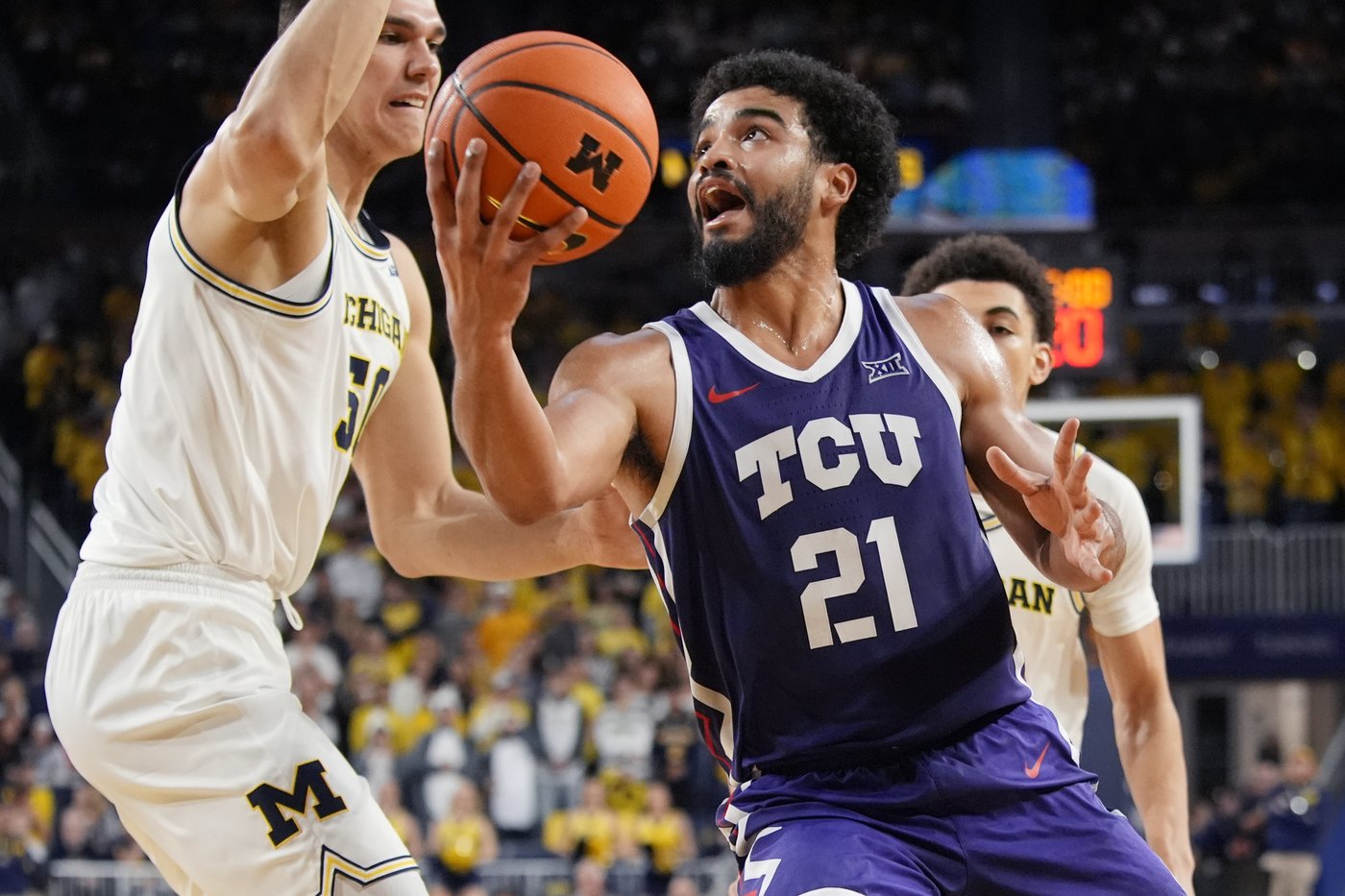 Nimari Burnett scores 16 and Danny Wolf secures a double-double to lead Michigan past TCU 76-64 | iNFOnews.ca