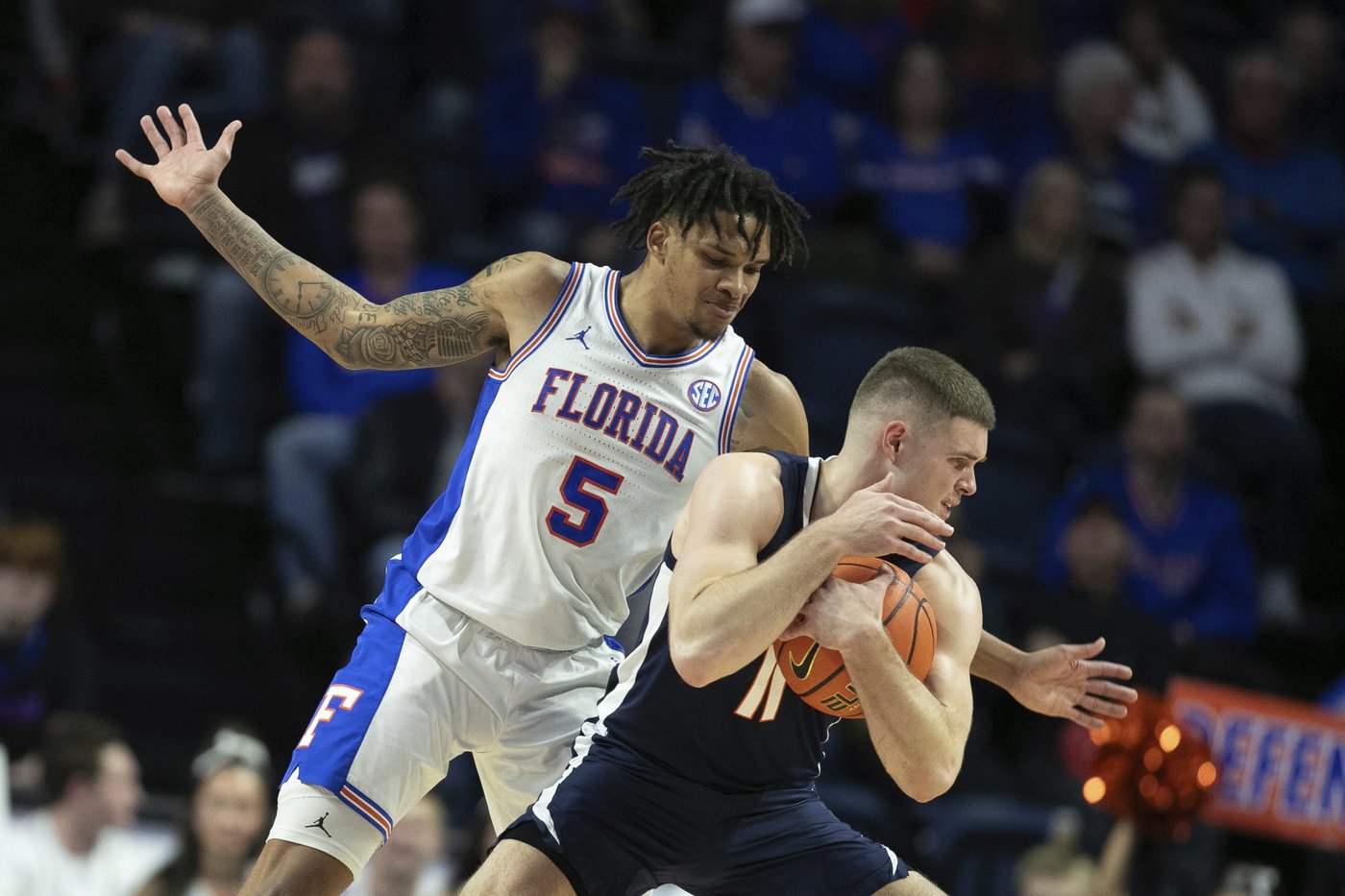 Walter Clayton scores 27 points, No. 13 Florida beats Virginia 87-69 in SEC/ACC Challenge | iNFOnews.ca