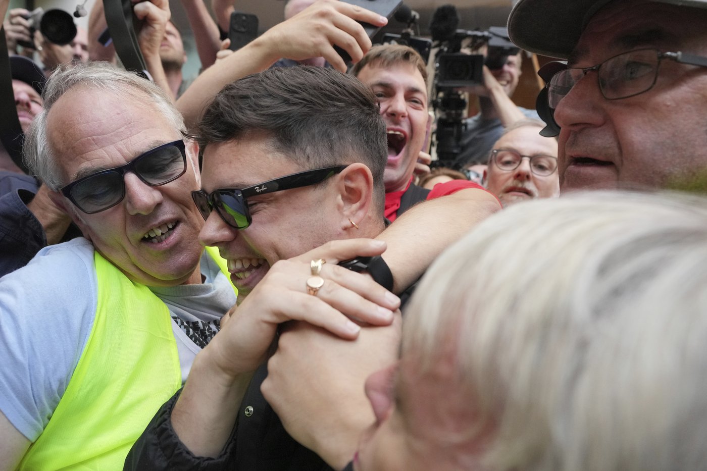 Fans of Irish band Kneecap surround a London court as rapper Mo Chara faces a terror-related charge | iNFOnews.ca