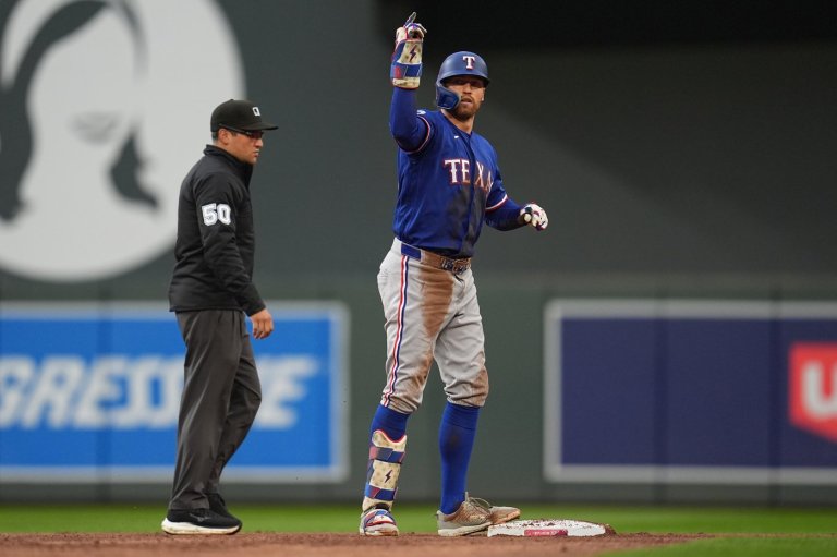 Rangers push the AL West race to the final day of the regular season with a 6-2 win over the Twins | iNFOnews.ca
