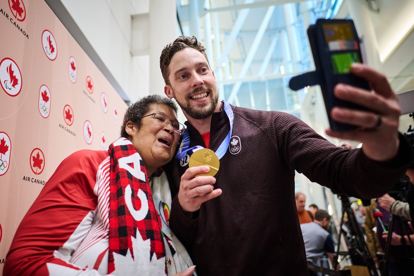 Photo Gallery: Canada's Olympians arrive home | iNFOnews.ca