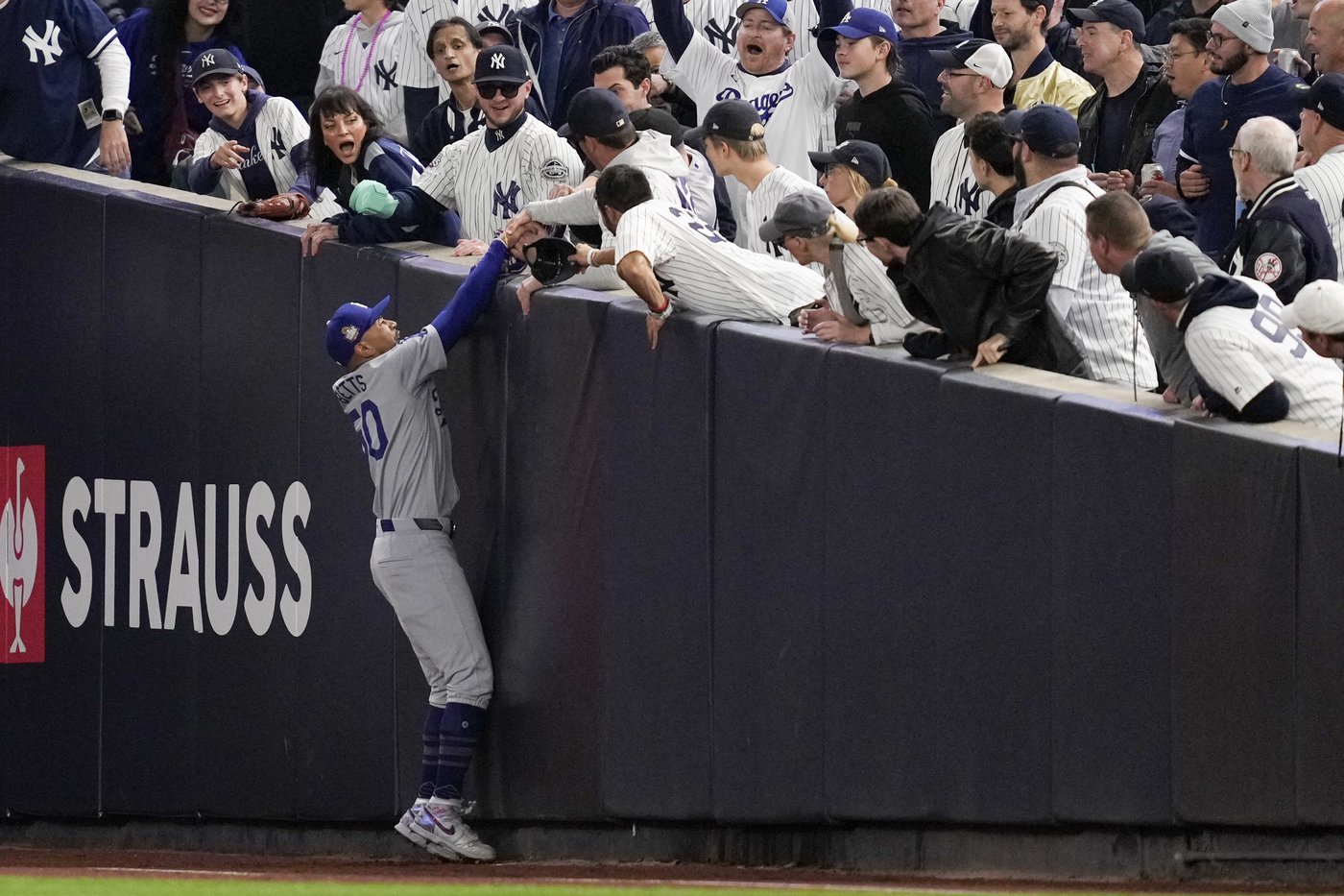 Yankees fans who interfered with Betts' catch are banned from Game 5 of the World Series | iNFOnews.ca