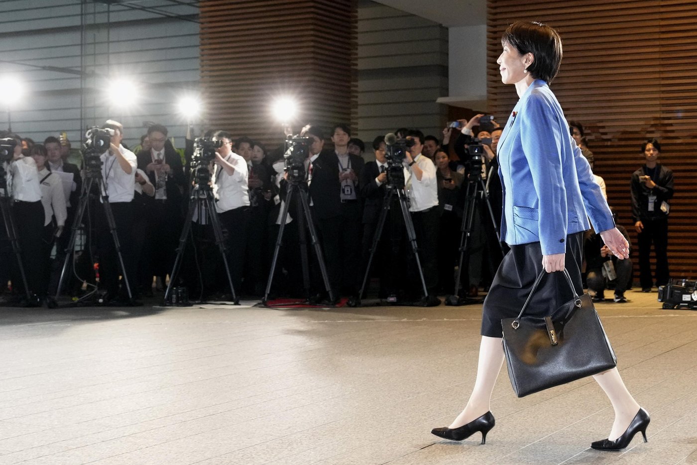 Japan's Takaichi is winning fans not with politics but with her style and 'work, work, work' mantra | iNFOnews.ca Japan's Takaichi is winning fans not with politics but with her style and 'work, work, work' mantra | iNFOnews.ca