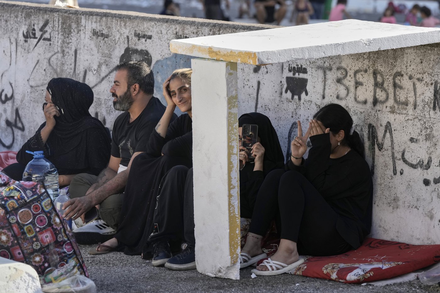Hundreds of fleeing families sleep on beaches and streets after Israel's strikes shake Beirut | iNFOnews.ca