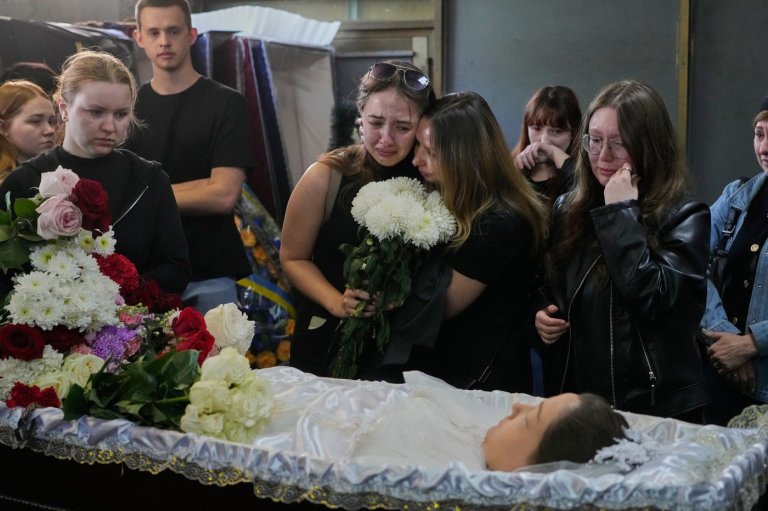 Young Kyiv couple killed in a fierce Russian airstrike hoped to start a family, mourners say | iNFOnews.ca