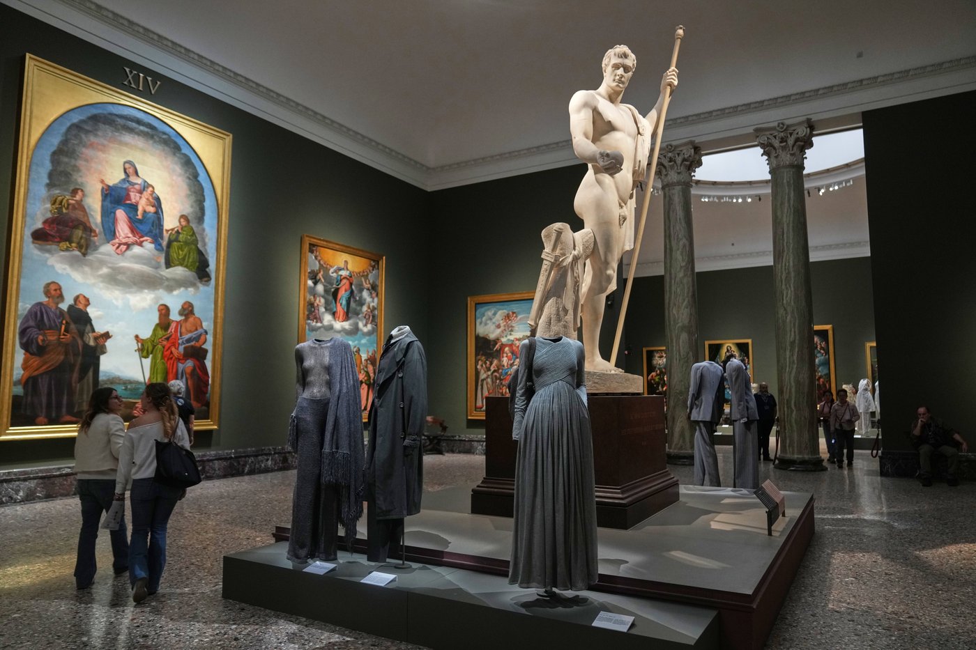 Giorgio Armani's sartorial creations interplay with Italian masterpieces at Milan museum exhibition | iNFOnews.ca