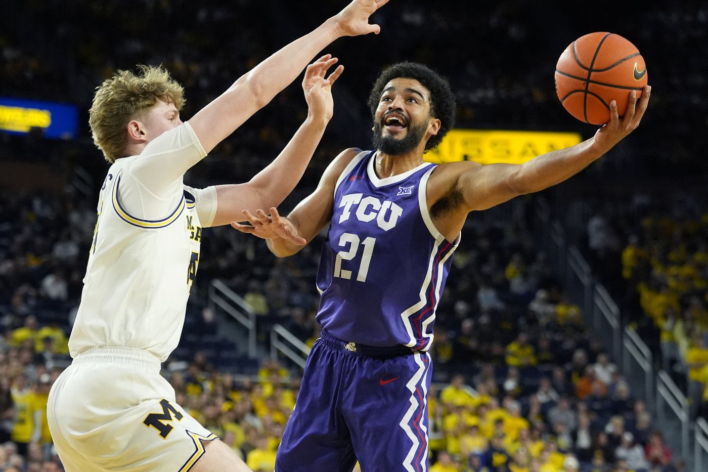 Nimari Burnett scores 16 and Danny Wolf secures a double-double to lead Michigan past TCU 76-64 | iNFOnews.ca