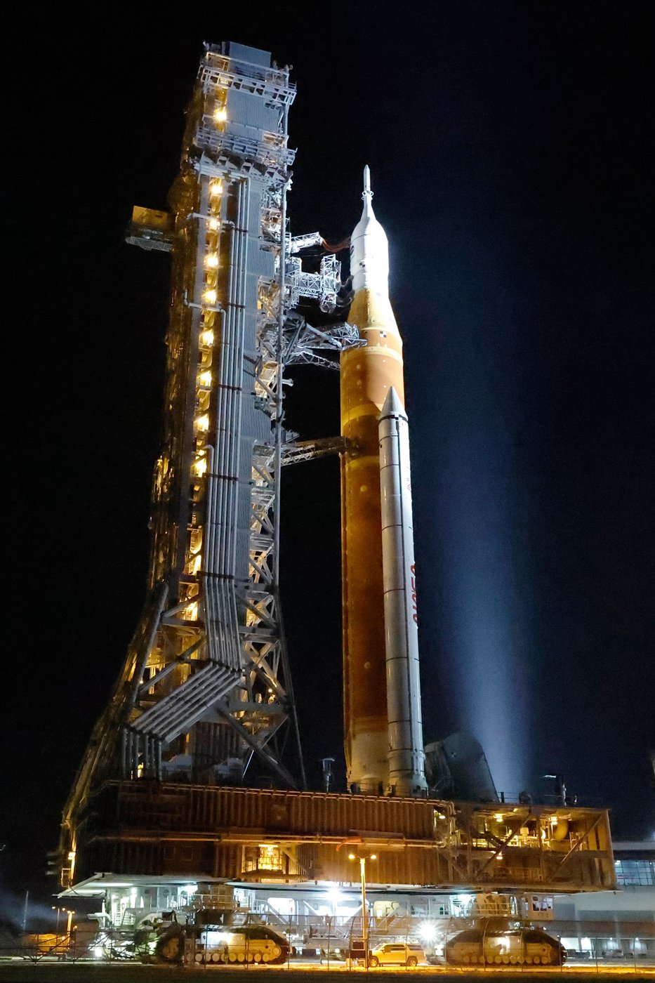 NASA hauls its repaired moon rocket from the hangar back to the pad for an early April launch | iNFOnews.ca