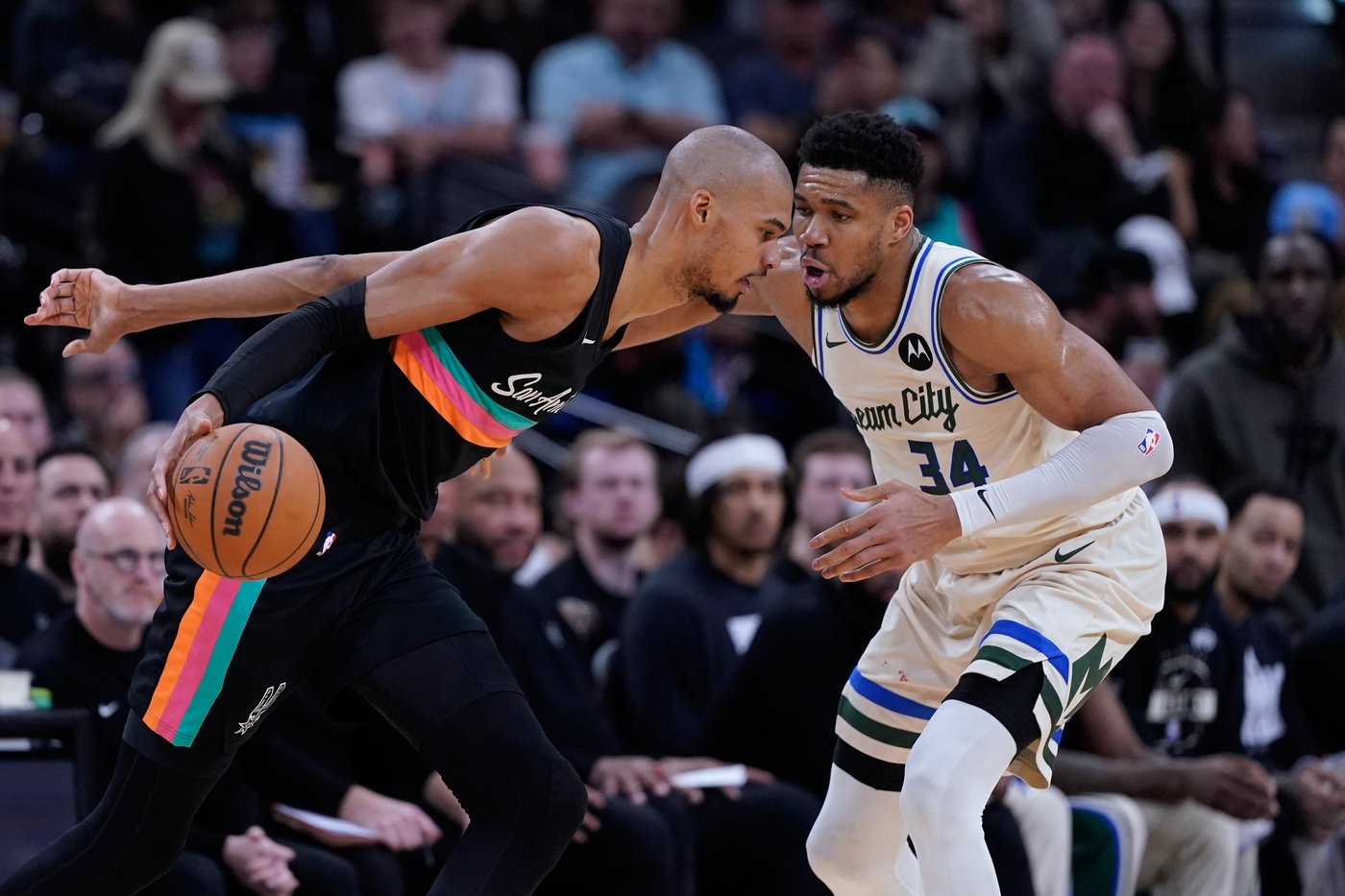 Wembanyama shaves head, shines brightly in leading Spurs past Antetokounmpo, Bucks | iNFOnews.ca